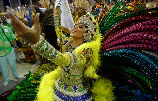 A dancer from the Imperatriz samba school sings during carnival celebrations at the Sambadrome in Rio de Janeiro, Brazil, Sunday, Feb. 19, 2012. ?AP Photo