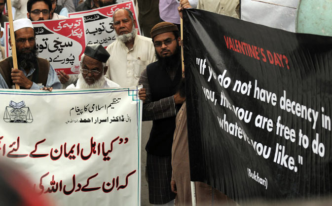Activists of Tanzeem-e-Islami hold placards and banners during a protest against Valentine’s Day in Karachi. The holiday is increasingly celebrated in Pakistan, a Muslim country where many conservatives disapprove of the occasion as a Western import. – AFP Photo.