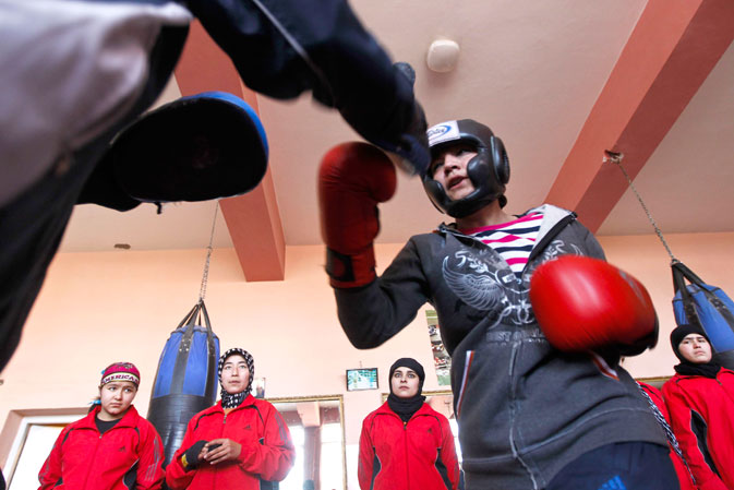 Her muscular shoulders rippling as she readies to throw punches at her coach, Rahimi said she feared the Taliban, who banned women from education, sports and most work, would regain a share in power through early talks with Afghan and US officials aimed at ending the Nato-led war. ?I hope the Taliban don?t come back and take over,? she said, wincing and starting to untie pink shoelaces over her knuckles, used instead of hard-to-get strapping. ?But if they do, I urge them to let women engage in sports and go to scho