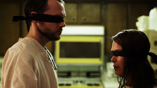 Chris Denham, left, and Nicole Vicius are shown in a scene from "Sound of my Voice?. ? Photo by AP.