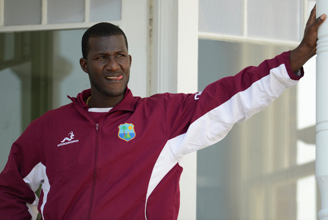 West Indies' captain Darren Sammy looks on from the dressing room balcony before a training session. ? Photo by Reuters