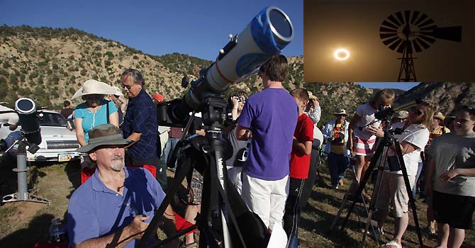 Craig Halbasch watches a rare annular eclipse dims the sky, as the sun and moon align for "ring of fire" spectacle over the southwestern town of Kanarraville, Utah Craig Halbasch watches a rare annular eclipse dims the sky, as the sun and moon align for "ring of fire" spectacle over the southwestern town of Kanarraville, Utah, May 20, 2012. The sun and moon aligned over the earth in a rare astronomical event - an annular eclipse that dimmed the skies over parts of Asia and North America, briefly turning the sun into a blazing ring of fire. Eclipses of some type occur almost every year, but stargazers have not seen an annular - shaped like a ring - eclipse on U.S. soil since 1994, and the next one is not to occur until 2023. REUTERS/Jim Urquhart (UNITED STATES - Tags:
