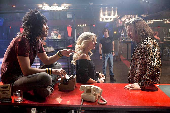 Actors Russell Brand (L), Julianne Hough, Diego Boneta and Alec Baldwin (R) are shown in a scene from the film ?Rock of Ages?