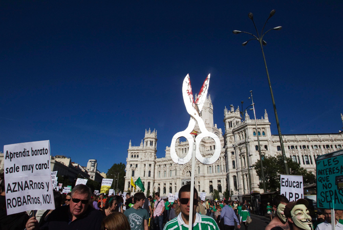 People march during a general students and teachers' strike against educational cuts imposed by the Spanish government, near the City Hall in central Madrid. ? Photo by Reuters