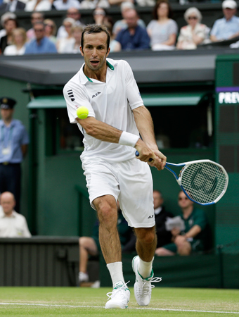 Radek Stepanek of the Czech Republic plays a return to Novak Djokovic of Serbia during a third round men's singles match. ? Photo by AP