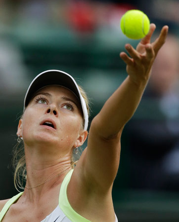 Maria Sharapova of Russia serves to Tsvetana Pironkova of Bulgaria during a second round women's singles match. – Photo by AP