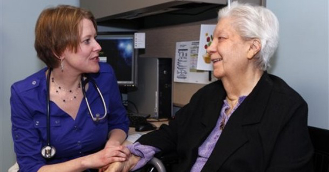 Dr Jennifer Dorosz Dr Jennifer Dorosz, left, checks the pulse of Mary Jane Eaton, 80, during her visit to the University of Colorado Anschutz Medical Center in Aurora, Colo. – AP