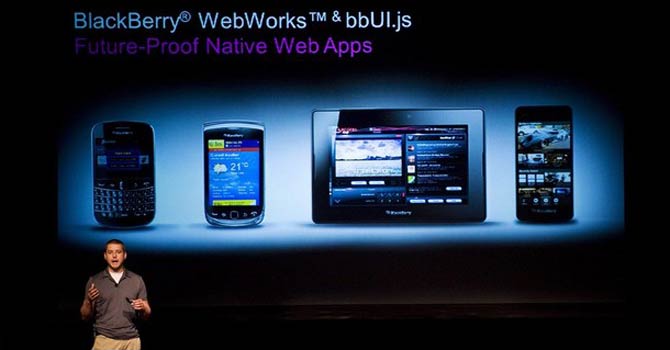 BlackBerry Tim Neil, Research In Motion Ltd.'s Canadian Operating Director of Operations, Platforms and Tools, speaks about the Blackberry 10 architecture during the RIM Blackberry 10 Jam World Tour in Toronto. – AP