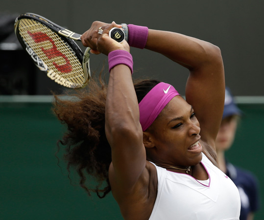 Serena Williams of the United States returns a shot to Barbora Zahlavova Strycova of the Czech Republic during a first round women's singles match. ? Photo by AP