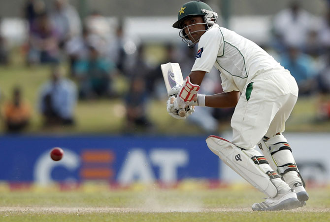 Pakistan's wicket-keeper Adnan Akmal offered resistance lower down the order and was unbeaten on 40 when his side were bowled out for 300. -Photo by Reuters