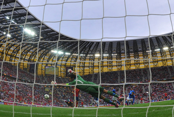 Italian goalkeeper Gianluigi Buffon dives during the Euro 2012 championships football match.