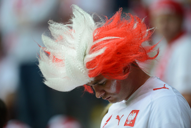 A Polish supporter attends the Euro 2012 championships football match.