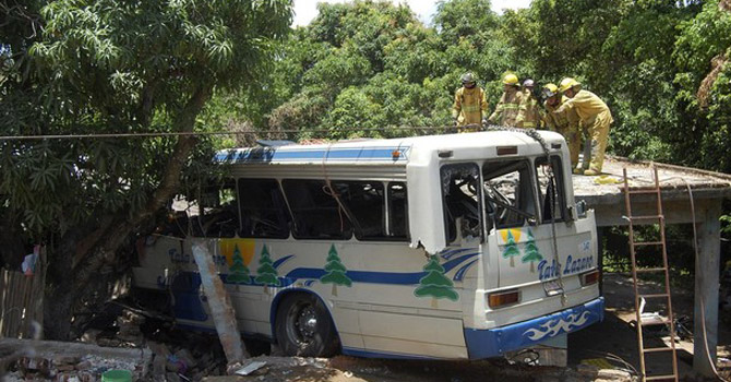 Firefighters-work-on-the-site-of-a-bus-crash670 Fire-fighters work on the site of a bus crash.—Reuters Photo