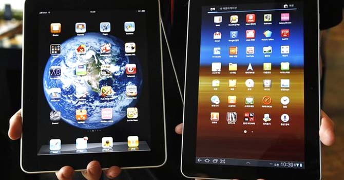 galaxy-tab-ipad-reu-670 The appellate judges refused to lift the injunction on the 10-inch Galaxy Tab computer, which Apple claimed was copied from the iPad. - File photo by Reuters
