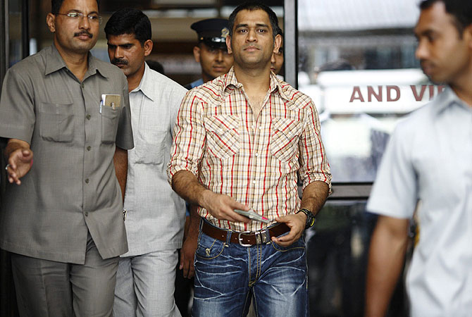 India's national cricket team captain Mahendra Singh Dhoni (C) arrives at the Tribhuvan International Airport during his two-day visit on invitation by the Indian Embassy in Kathmandu, Nepal. -Photo by Reuters