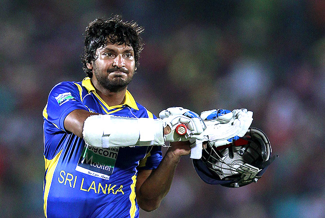Sri Lanka's Kumar Sangakkara walks off the field after his dismissal. -Photo by Reuters
