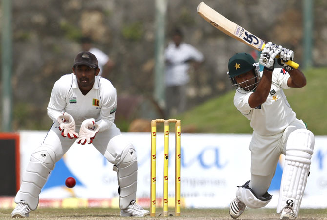 Asad Shafiq drives. Shafiq combined with Younis in a 155-run stand. -Photo by AP