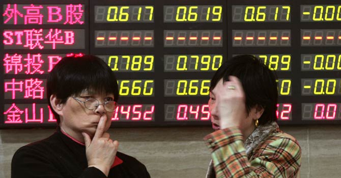 Stocks market in Shanghai, China. - File Photo