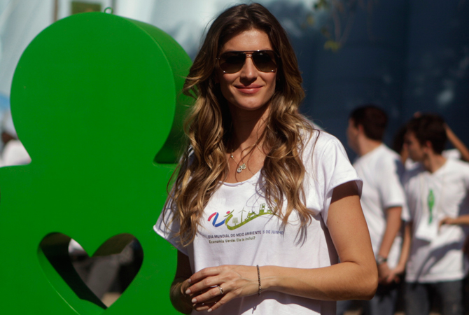 Brazilian model Gisele Bundchen poses before planting a tree during the Green Nation Fest to celebrate World Environment Day in Rio de Janeiro. ? Photo by Reuters