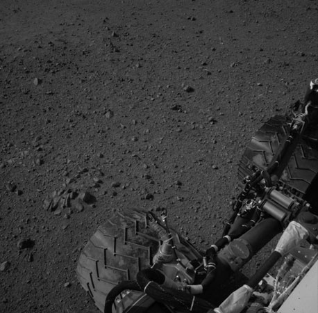 Curiosity's tires during its first test drive as seen by Navcam. A little more than two weeks after its arrival on Mars, the $2.5 billion rover, which landed on Mars on August 6, has performed a battery of tests and appears ready to embark on its two-year mission to explore the Red Planet in the hunt for signs of life.