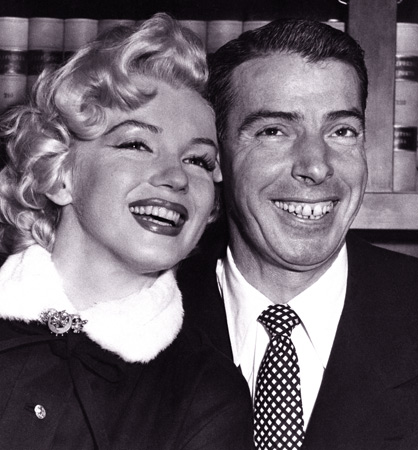 In this Jan. 14, 1954 file photo, Joe DiMaggio baseball's famed "Yankee Clipper," and screen actress Marilyn Monroe, smile cheek to cheek as they wait patiently in Judge Charles Perry's chambers for their marriage ceremony in San Francisco. The wedding climaxed a romance of more than a year. — AP Photo