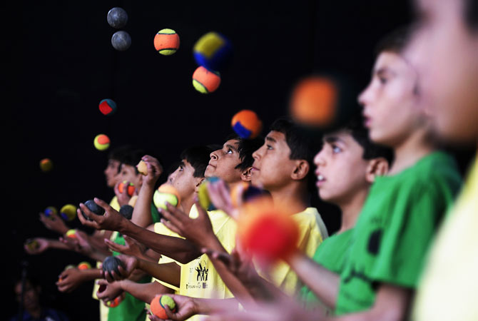 Jugglers perform during the 7th Afghanistan Juggling Championships in Kabul on August 27, 2012.
