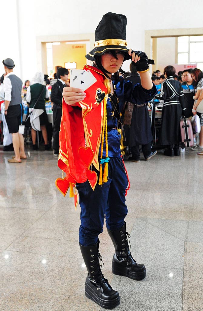 A cosplay fan poses in character. - Photo by AFP