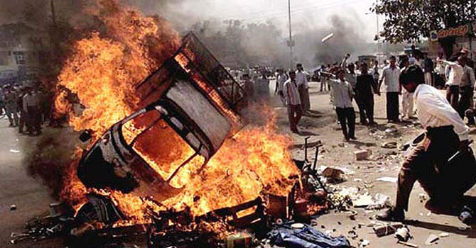 gujarat_riots_670 A file image shows burning and protests during the Gujarat riots of 2002. – Dawn file photo