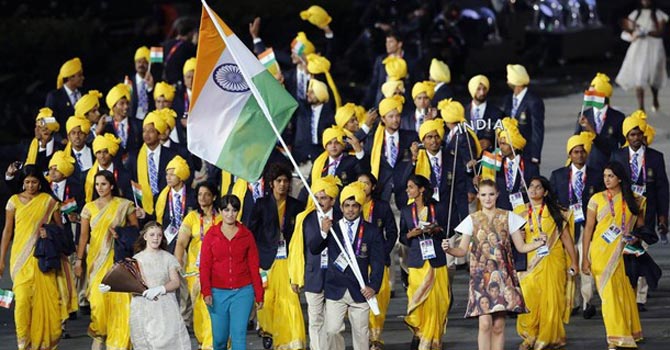 india's-olympic-delegation670 An unidentified woman with India Olympics delegation — Reuters Photo