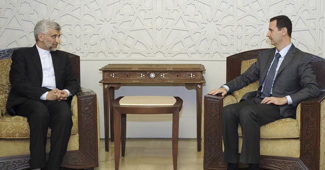 Syria's President Bashar al-Assad meets Iran's Supreme National Security Council secretary Saeed Jalili in Damascus Syria's President Bashar al-Assad (R) meets Iran's Supreme National Security Council secretary Saeed Jalili, in Damascus August 7, 2012, in this handout photo distributed by Syrian News Agency (SANA). REUTERS/Sana/Handout (SYRIA - Tags: POLITICS CONFLICT) FOR EDITORIAL USE ONLY. NOT FOR SALE FOR MARKETING OR ADVERTISING CAMPAIGNS. THIS IMAGE HAS BEEN SUPPLIED BY A THIRD PARTY. IT IS DISTRIBUTED, EXACTLY AS RECEIVED BY REUTERS, AS A SERVICE TO CLIENTS