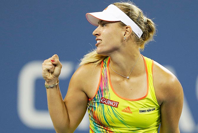 Angelique Kerber of Germany reacts after defeating Venus Williams. -Photo by Reuters