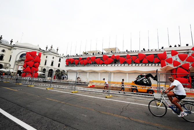Workers setup the entrance of the Lido Casino hosting the Venice film festival on August 27, 2012 in Venice.