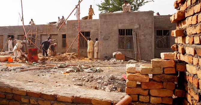village-houses670 Under construction structures — File Photo
