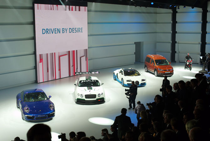 Cars are displayed at the end of the Volkswagen Group Night, in Paris, Wednesday Sept. 26, 2012, prior to the Paris Auto Show.