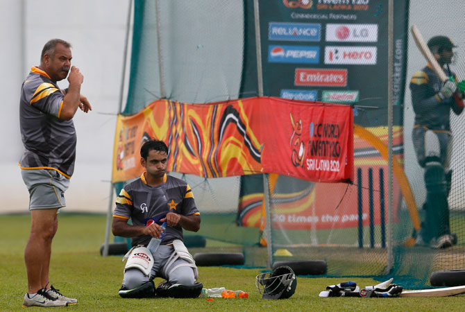 Pakistan's coach Dav Whatmore, left, and captain Mohammad Hafeez, center, watch bowlers during a practice session ahead of their ICC Twenty20 Cricket World Cup. ? Photo by AP