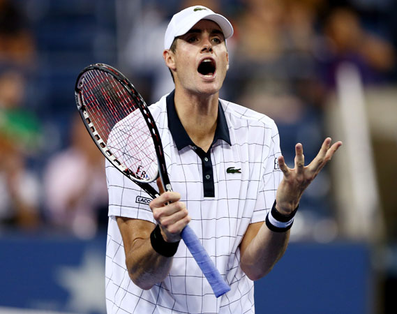 John Isner of the USA reacts to a lost point in the fourth set against Phillip Kohlschreiber of Germany during Day Seven of the 2012 US Open.