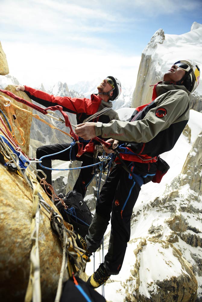 Mammut, Peter Ortner and David Lama ascend the Trango Summit in northern Pakistan's Karakoram mountain range. When they reached the summit, a camera mounted to a small remote-controlled helicopter recorded stunning images of the trio surrounded by the Karakoram range. ? Photo by AP