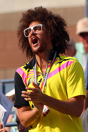 Stefan 'Redfoo' Gordy of the American electro duo LMFAO attends the women's singles semifinal match between Victoria Azarenka of Belarus and Maria Sharapova of Russia. -Photo by AFP