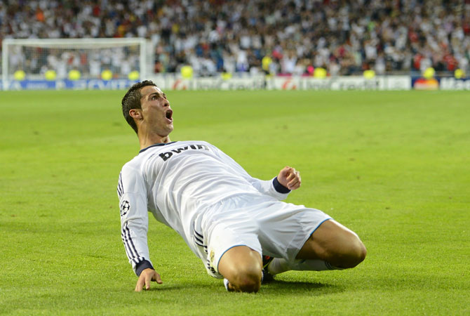 Real Madrid's Portuguese forward Cristiano Ronaldo celebrates after scoring during the UEFA Champions League football match Real Madrid against Manchester City at the Santiago Bernabeu stadium in Madrid. ? Photo by AFP