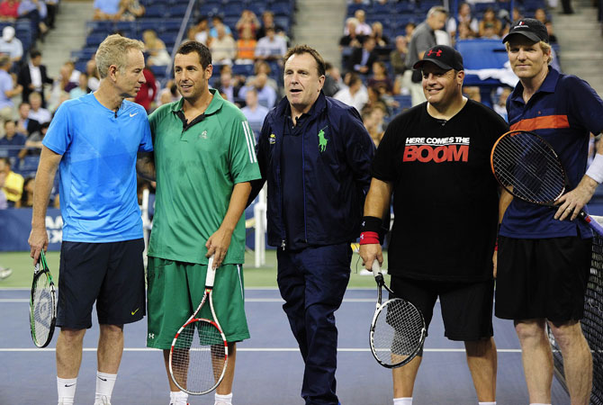 (Left to Right) John McEnroe, actor Adam sandler, actor Colin Quinn, Jim Courier and actor Kevin James pose during an exhibition match at the 2012 US.