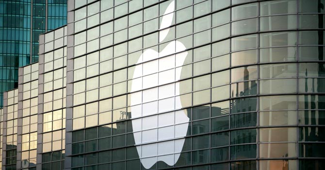 apple-logo-store-afp-670 A file photo shows the Apple logo on a building in San Francisco. Apple won more than $1 billion in a massive victory on August 25, 2012 – File photo by AFP