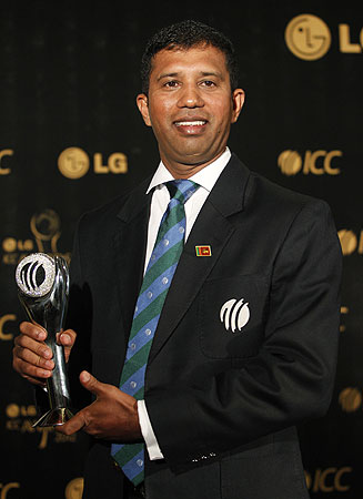 Sri Lanka's Kumar Dharmasena, winner of the International Cricket Council (ICC)'s Umpire of the Year Award, poses with the trophy. -Photo by Reuters