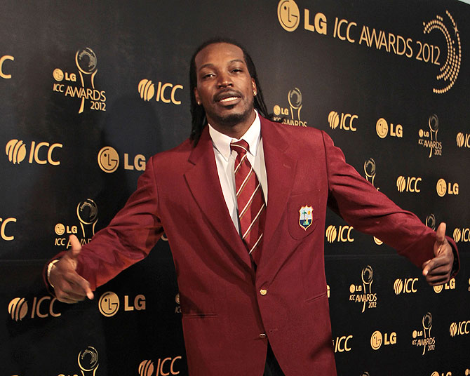 West Indies cricketer Chris Gayle poses as he arrives for the ICC Awards 2012 in Colombo, Sri Lanka. -Photo by AP