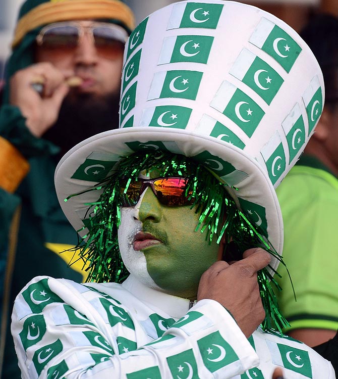 A Pakistan fan looks on during the match. -Photo by AFP