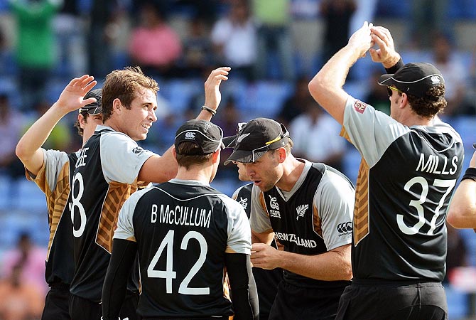 New Zealand celebrate the wicket of Imran Nazir. -Photo by AFP