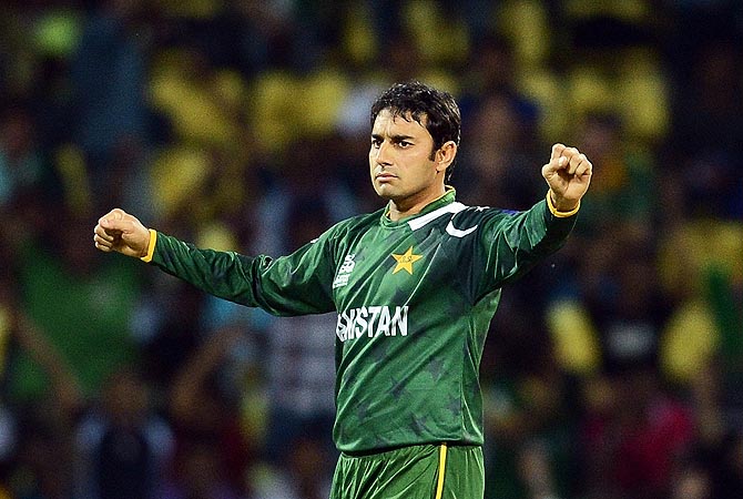 Saeed Ajmal celebrates taking the wicket of Daniel Vettori. -Photo by AFP