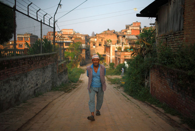 A man walks in the ancient Nepalese city of Bhaktapur.