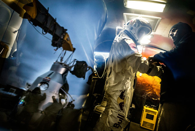Red Bull, pilot Felix Baumgartner of Austria, stands in his trailer during the preparation for the final manned flight of Red Bull Stratos in Roswell, N.M. on Saturday, Oct. 6, 2012. Felix Baumgartner plans to ascend to 120,000 feet in a stratospheric balloon and make a freefall jump rushing toward earth at supersonic speeds before parachuting to the ground. ? Photo by AP