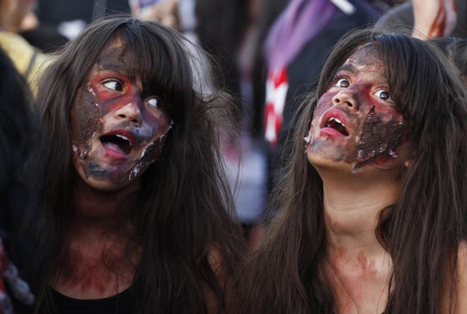 Girls dressed up as zombies participate in a "zombie walk" in Ciudad Juarez .?Reuters Photo