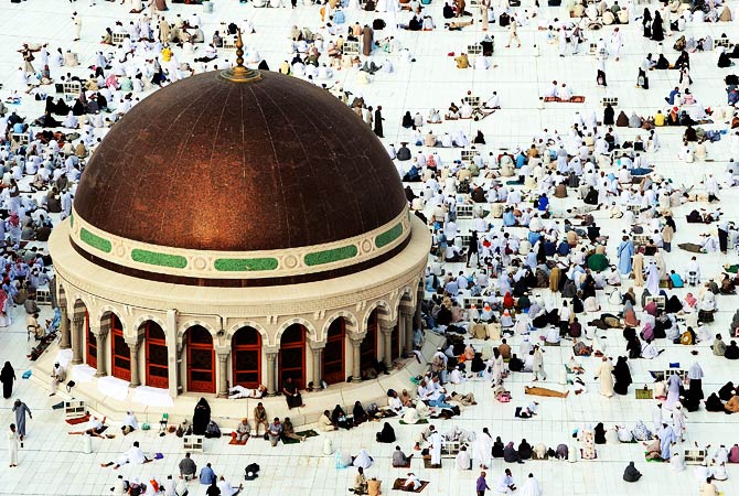 Muslim pilgrims wait for the start of prayers at the Grand Mosque in the Saudi holy city of Mecca. ? Photo by AFP